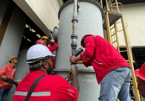 Industrial piping and vertical tank valve maintenance work